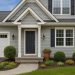 Beautifully landscaped front yard with new paint, modern lighting, and lush green plants
